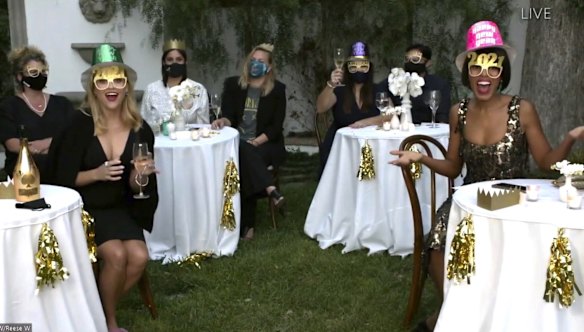 Reese Witherspoon, left, and Kerry Washington, right, speak during the 72nd Emmy Awards broadcast.