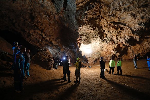 Rescue teams gather in a deep cave where a group of boys went missing in Chang Rai, northern Thailand
