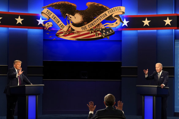 Moderator Chris Wallace of Fox News (centre) during the first presidential debate between President Donald Trump, left, and Democratic candidate Joe Biden.