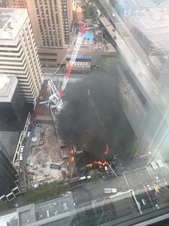 Black smoke billowed from the fire at Circular Quay.