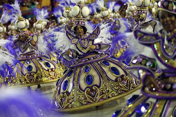 A performer from the Viradouro samba school parades during Carnival celebrations at the sambadrome in Rio de Janeiro, Brazil.