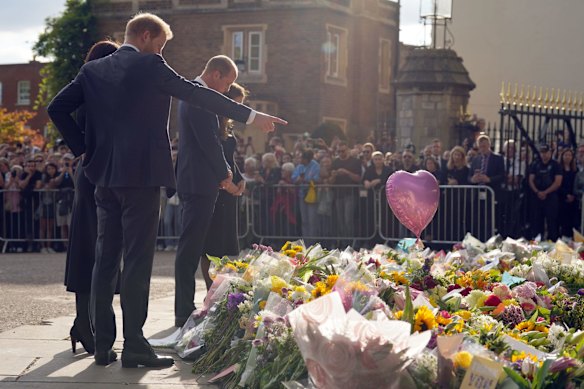 Crowds have gathered and tributes left at the gates of Windsor Castle to Queen Elizabeth II, who died at Balmoral Castle on September 8, 2022.