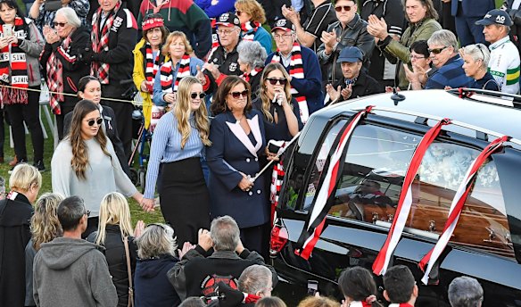 The hearse makes final lap of honour of Moorabbin oval.