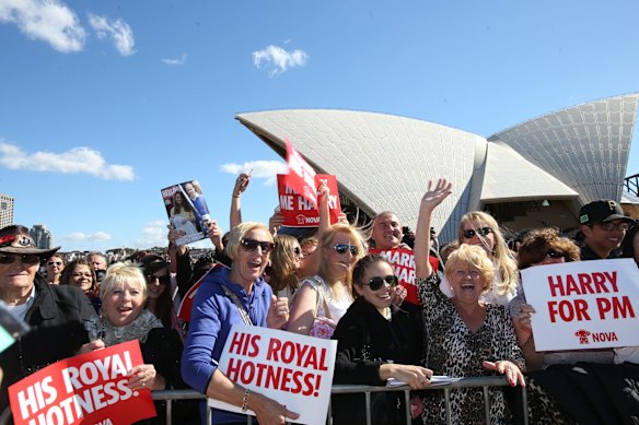 Crowd cheering for his royal hotness
