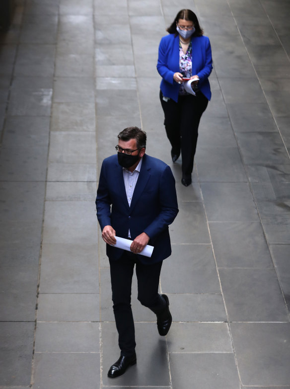 Health Minister Jenny Mikakos trails Premier Daniel Andrews into a daily press briefing.