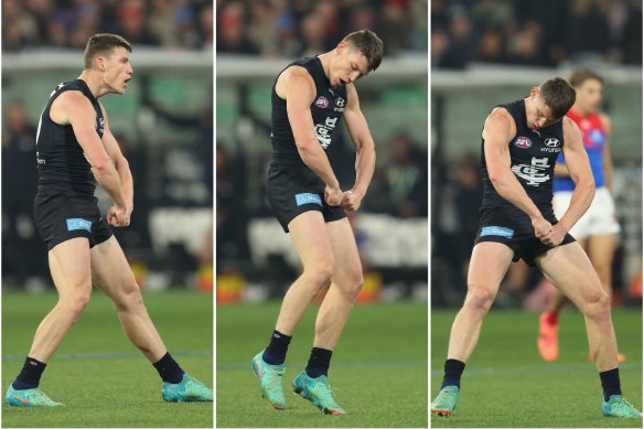 Carlton’s Sam Walsh flexes his muscles after kicking the Blues’ first goal against Melbourne on Thursday night.