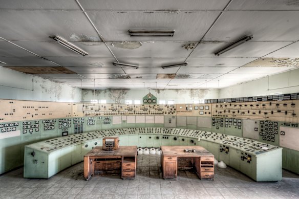 A broad view of the control panel and timber phone desks in the White Bay Power Station Control Room.