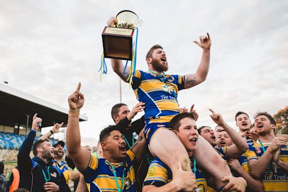 Woden Valley Rams captain Jeffrey Morgan celebrates their win.

