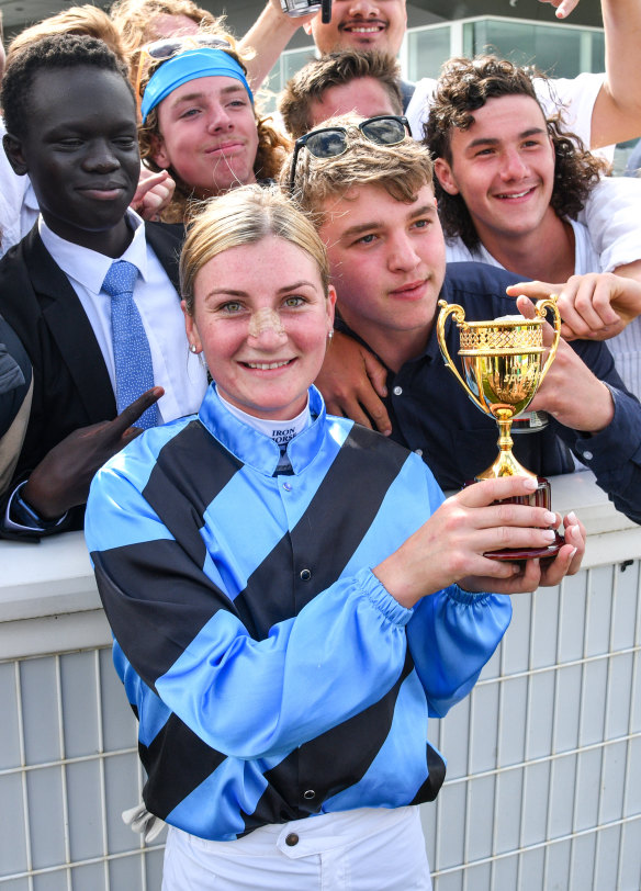 Jamie Kah poses with the cup.