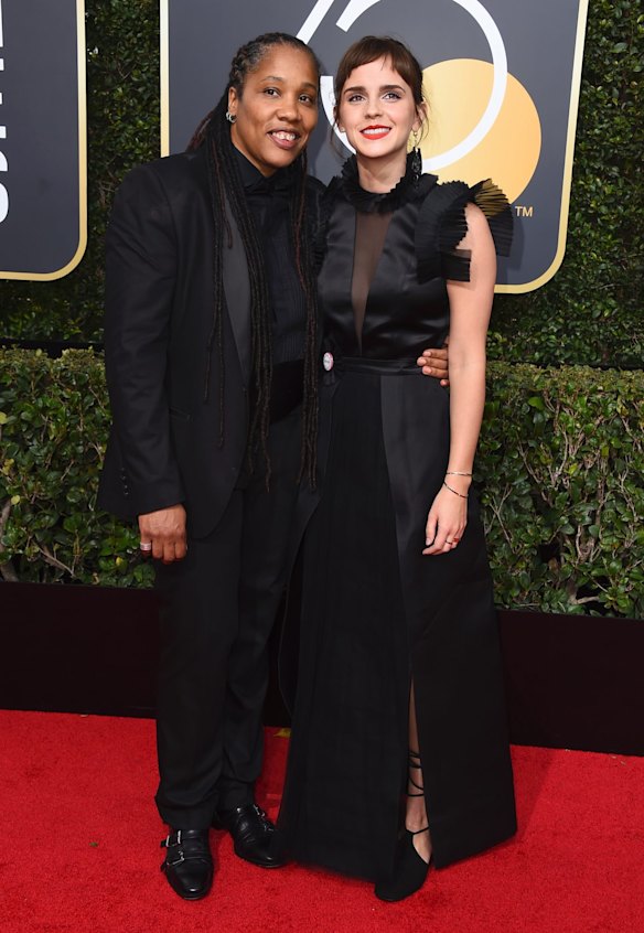 Marai Larasi, left, and Emma Watson arrive at the 75th annual Golden Globe Awards.