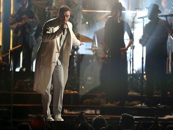 Sam Smith performs <i>Pray</i> at the 60th annual Grammy Awards.