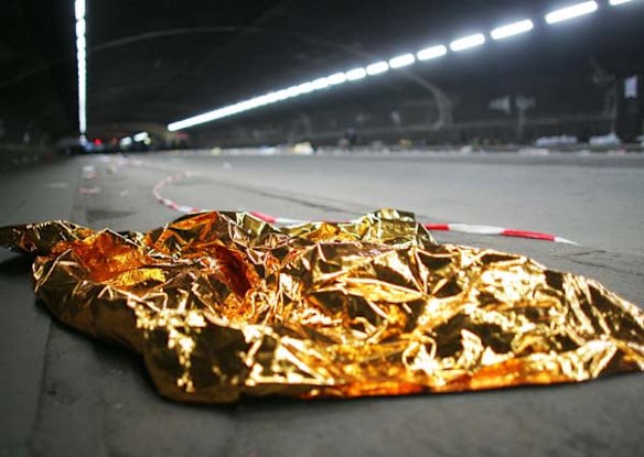 A rescue blanket on the ground in the tunnel where panic broke out during the Love Parade in Duisburg, western Germany.