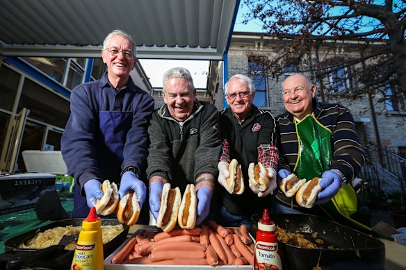 Phillip Bryan, Paul Limmer, David Daish and Chris Durman from the P.U.G Men's Shed Community have sold 500 sausage sizzles and 200 egg and bacon rolls at the Pyrmont Community Centre on Election day, in Pyrmont, Sydney.