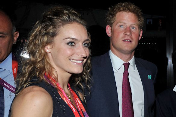 Prince Harry and Winter Olympics gold medalist Amy Williams arrive at the opening ceremony.