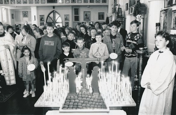 The Chernobyl children gather in the Russian Orthodox Church at Collingwood to commemorate the fifth anniversary of the nuclear accident. The children are guests of the Victims of Chernobyl National Relief Fund and will stay with Australian families for more than a month,  26th of April, 1991.  Photo: Sebastian Costanzo

