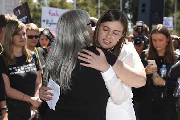 March organiser Janine Hendry embraces Brittany Higgins after her speech at the Women's March 4 Justice at Parliament House in Canberra.