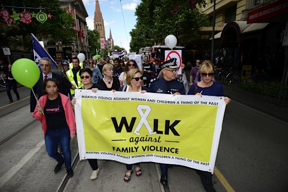 Rosie Batty and Chief Commissioner Ken Lay at the Walk Against Family Violence that started and ended at Federation Square, November 25, 2014. 