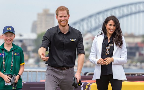 Britain's Prince Harry, the Duke of Sussex and his wife Meghan, the Duchess of Sussex are seen during the Jaguar Land Rover Driving Challenge on Day 1 of the Invictus Games on Cockatoo Island in Sydney