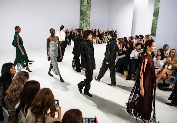 Models return to the runway for applause at the Esse Studios show at Australian Fashion Week.