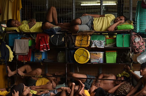Prisoners sleep in a classroom in Quezon city jail.