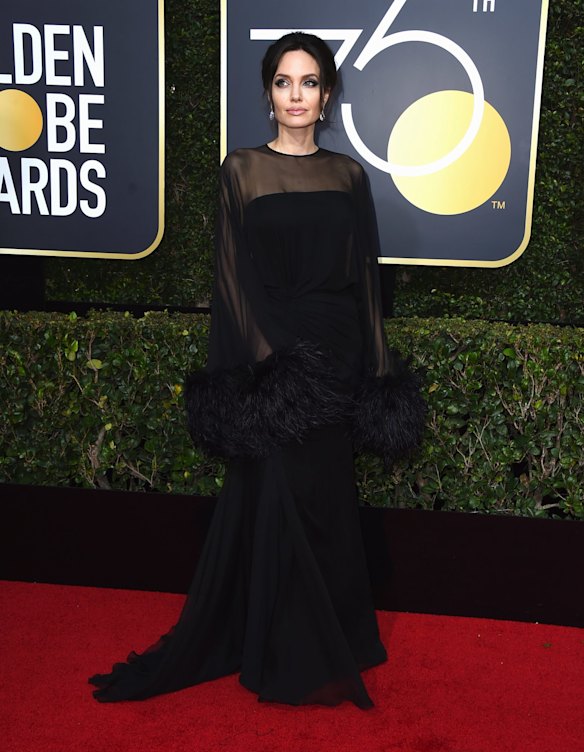 Angelina Jolie arrives at the 75th annual Golden Globe Awards.