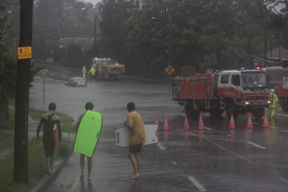 Teenagers try to make the most of the wet conditions in Roseville.