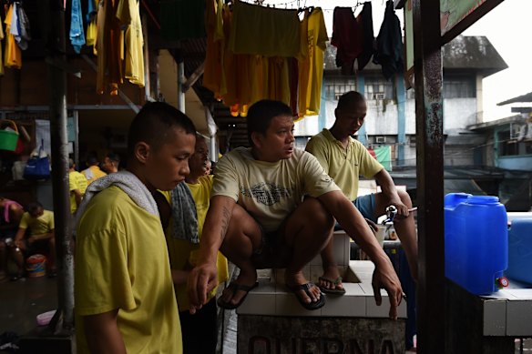  Inmates in a common area inside Quezon City Jail, Manila, Philippines.