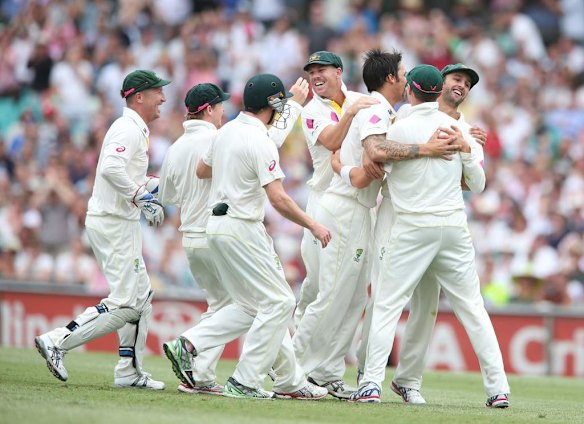 Mitchell Johnson celebrates the wicket of Michael Carberry, out for a duck.