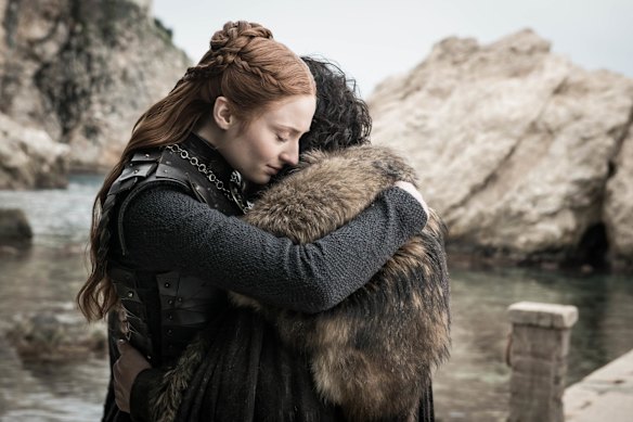Sansa Stark and Jon Snow embrace.