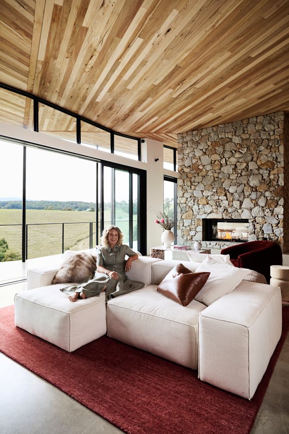 “The stone is from a disused quarry on the property, and the reclaimed hardwood is from
demolished homes around Victoria,” says Tibballs. The sofa is from MCM House.