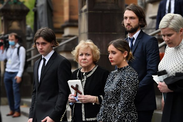 Mr Fahey's widow Colleen and her grandchildren.