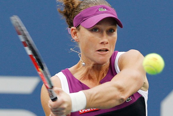 Samantha Stosur of Australia returns a shot to Serena Williams during the women's championship match at the US Open.