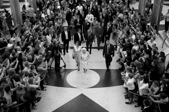 Her Majesty the Queen accompanied by Prime Minister Julia Gillard arrives at the Marble Foyer for the Parliamentary Reception given by Prime Minister Julia Gillard and Tim Mathieson at Parliament House Canberra on Friday 21 October 2011.