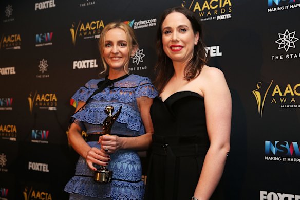 Sarah Scheller and Alison Bell pose win the AACTA Award for Best Screenplay in Television for ABC Comedy Showroom - The Letdown at the 6th AACTA Awards in Sydney, Australia.