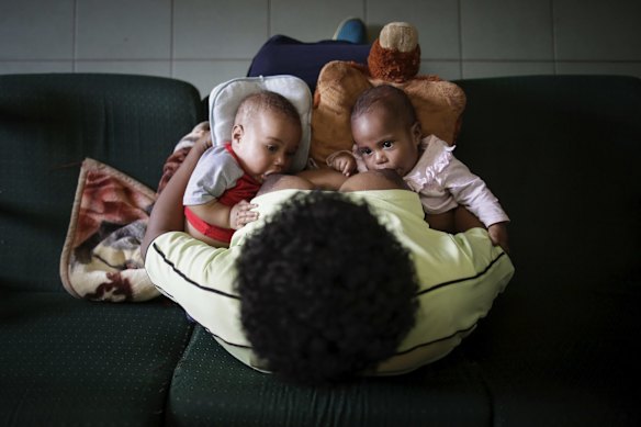 Susu Mamas midwife Sylvia Nikints breastfeeds her 5-month-old babies Zita and Zion during her break while working at the Susu Mamas clinic in Mount Hagen. Susu Mamas provides maternal and child health services to the doorstep of remote communities operates in 6 provinces and the National Capital District. 