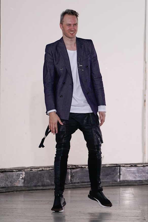 Maticevski taking his bow in Paris in 2019 during the haute couture season. 