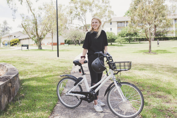 Charlotte England, pictured above, is one of thousands of Canberrans using Airbike to travel around the city. 
