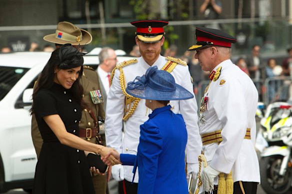 Britain's Prince Harry The Duke of Sussex (centre) and his wife the Duchess of Sussex Meghan (left) speak with his Excellency General the Honourable David Hurley Governor of NSW second (right) and Linda Hurley before attending the opening of the enhanced ANZAC Memorial in Sydney.