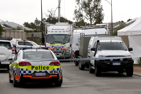 Forensic Services attend the scene where three people were found dead in Ellenbrook last month.