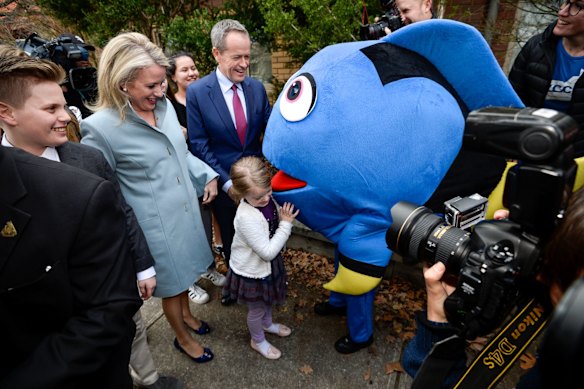 Opposition leader Bill Shorten voting in his federal seat of Marribyrnong in Melbourne's north. Bill with wife Chloe and daughter Clementine meet Dory the fish from the Australian Youth for climate Coalition urging Bill to protect the reef.