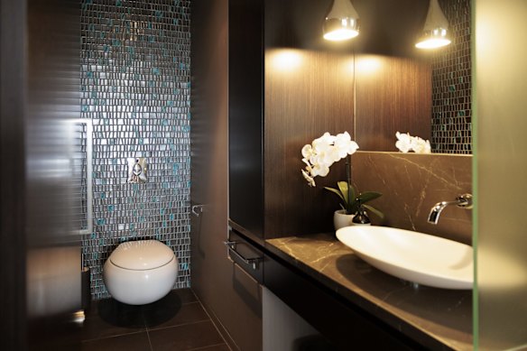 Bathroom next to office space.