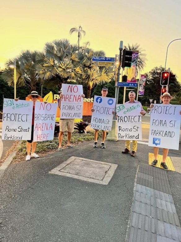 Residents protest against the proposed arena at Roma Street.