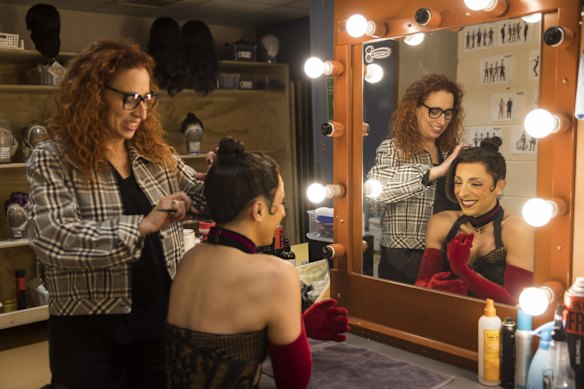 Wig, hair and make-up design associate Kylie Clarke with performer Chris Scalzo.