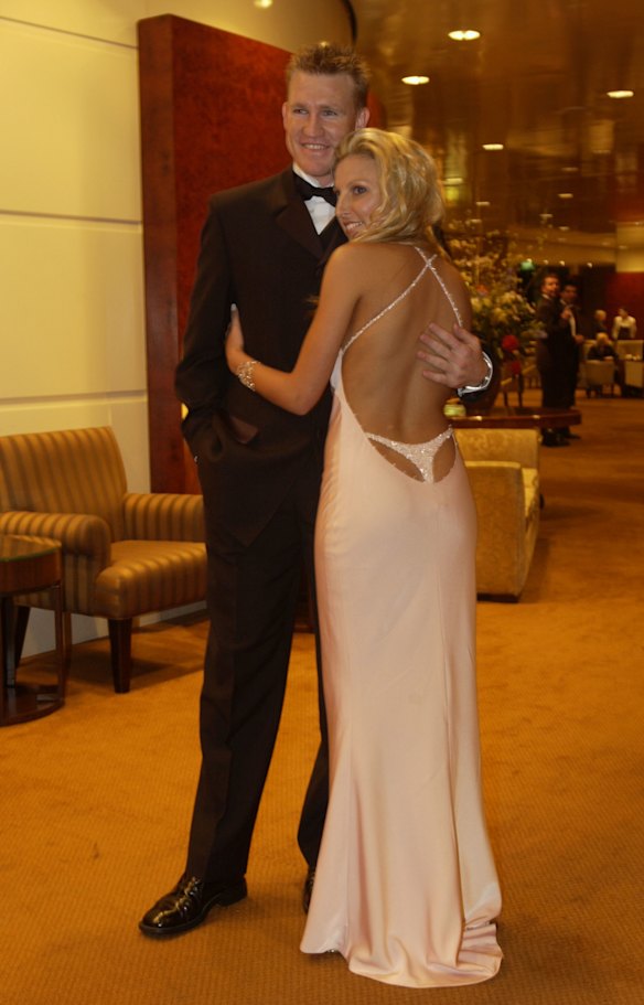Tania Buckley with Nathan Buckley at the 2001 Brownlow. The whale tail detail of Buckley’s dress was considered risque at the time, but turned out to be simply ahead of its time: Hailey Bieber has worn a similar style on not one, but two occasions. 