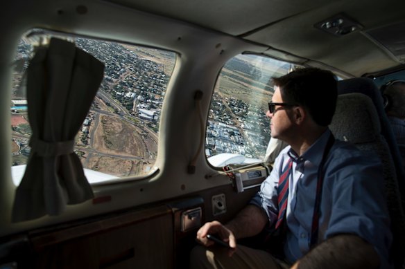Minister for Agriculture and Water Resources David Littleproud views the town of Longreach, Queensland, as his plane prepares to land.