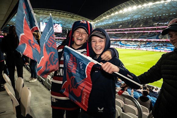 Jhai and Harry are ready for the game to start at Allianz.