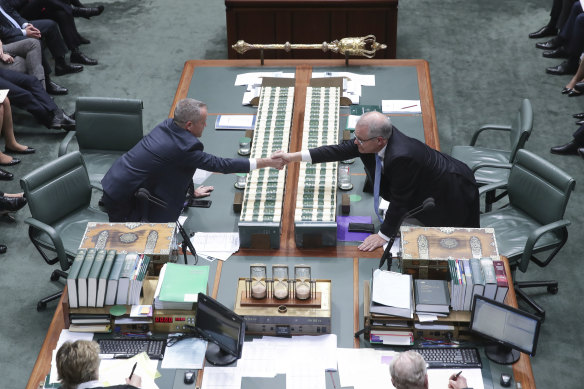 Opposition Leader Bill Shorten and Prime Minister Scott Morrison shake hands at the start of Question Time.