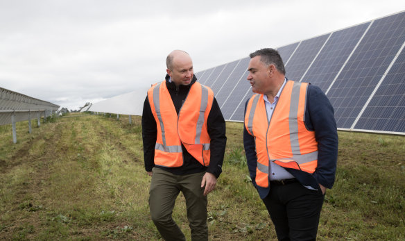NSW Energy and Environment Minister Matt Kean (left) with John Barilaro, the Deputy Premier and Nationals leader, during a visit in August 2020 to a solar farm near Dubbo.