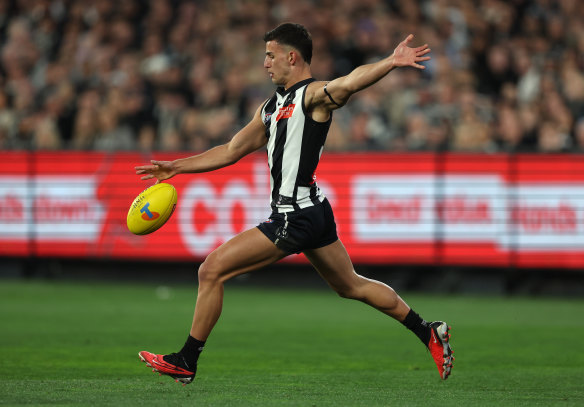 Kicking on: Nick Daicos has a chance to forge his place in history against Brisbane on Saturday.