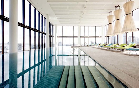 SWIM AND THE CITY. Crown Metropol, Melbourne. This ultra-modern $300 million hotel features a stunning sky-high swimming pool. Located on the 27th floor, the waterfall-edge pool is in a double-height, glass-enclosed atrium with views of the city. 